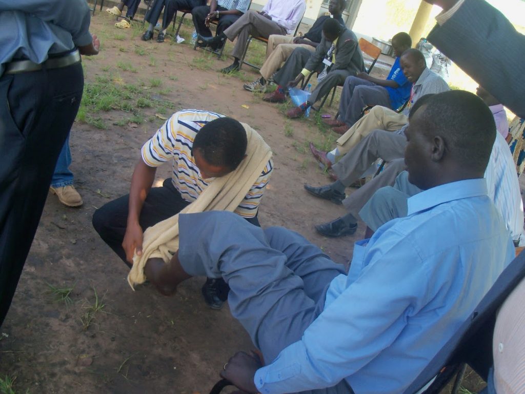 Genesis Tinshu washes the feet of Pastors in South Sudan in 2012